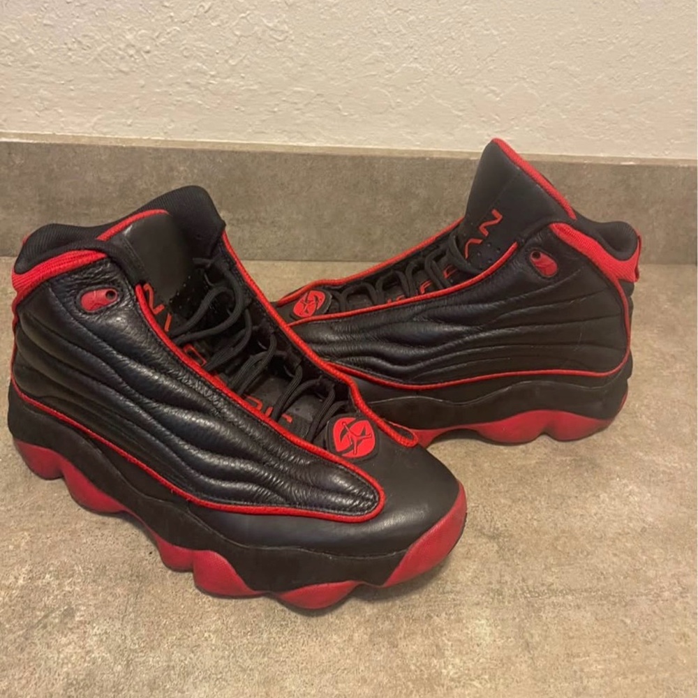 Jordan Men’s Black and Red 13s